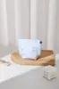 Bolsa de Cosméticos para Niñas Bordada con Lazo Fresca y Dulce Bolsa de Almacenamiento para Productos de Cuidado de la Piel de Viaje Bolso de Mano Portátil Lindo