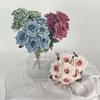Celebridad de internet 7 cabezas capsicino rosa flor artificial boda hogar decoración suave relieve foto realista decoración transfronteriza