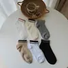 Calcetines invisibles para mujer Zhuji, calcetines de media pantorrilla estilo japonés para primavera y otoño, calcetines holgados de color liso transpirables que absorben el sudor, calcetines para hombre de fábrica al por mayor
