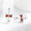 Transmisión en vivo súper ventas nuevos aretes de perla con moño estilo coreano moda personalidad versátiles aretes de perla sintética dropshipping