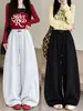 Calça de moletom feminina preta, novo estilo outono 2026, calça casual americana de perna larga, plus size, corte solto, design de perna curva