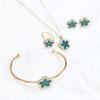 Collar y pulsera con colgante de cuatro piezas de flor de ciruelo de fritillaria negra de doble cara CDD, anillo y trébol de cuatro hojas, suministro de comercio exterior
