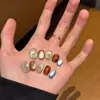 [Sol y Luna Brillan Juntos] Uñas Portátiles Hechas Completamente a Mano Otoño e Invierno 2025 Nuevo Brillo Cuentas de Vidrio Ojo de Gato Estilo Corto Manicura Blanqueadora