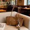 Bolsa de Ombro Transfronteiriça para Mulheres 2026 Outono e Inverno Novo Estilo Alto Valor Retrô Versátil Grande Capacidade Bolsa Tote de Ombro para o Dia a Dia