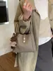 Bolso Cubo Sencillo de Mano Estilo Coreano para Mujer 2026 Nuevo Modelo Invierno Bolso de Hombro Cruzado Minimalista Elegante de Alta Calidad