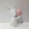Comercio Exterior Exportación Polvo Cerámico Conejo Sosteniendo Huevo Adorno Pascua Decoración Hogar Forma Animal Regalo Porcelana Blanca