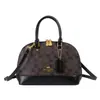 Bolsa de Ombro Vintage Nova Moda Outono/Inverno 2026 Feminina Monograma Versátil Estilo Europeu e Americano Formato de Concha Personalidade Única