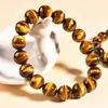 Colección de Pulseras de Ojo de Tigre Amarillo Natural Patrón Rayo Grado Ojo de Tigre Petrificado Madera Piedra Preciosa Ketang Donghai Venta al por Mayor