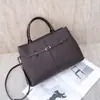 Togo piel de vaca de primera capa bandolera oblicua para mujer gran capacidad moda simple bolsa de compras multibolsillo bolsa de trabajo piel suave