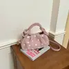 Bolso plisado de lunares dulce para mujer, nuevo estilo 2026, adecuado para el trabajo y los desplazamientos, un bolso de hombro o bandolera retro único y versátil