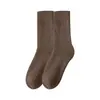 Calcetines calcetines de media pantorrilla para hombre estilo universitario calcetines largos de cintura alta para hombre negros combinan con todo cálidos gruesos calcetines de rizo invierno al por mayor
