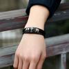 Ventas directas de fábrica Venta al por mayor de joyería europea y americana Pulsera de cuero vacuno para hombre con cuentas personalizadas de calavera Accesorios de venta caliente