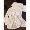 Pijama dulce con estampado de corazones para mujer, nuevo estilo de otoño, talla grande, manga larga, estilo cárdigan, conjunto de ropa para el hogar de corte holgado, se puede usar para salir
