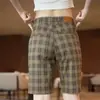 Pantalones cortos casuales a cuadros de alta gama para hombre transfronterizos, pantalones rectos ajustados, tendencia de moda fina de verano para hombre