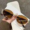 Gafas de Sol Metálicas de Moda con Montura Ovalada Gafas de Sol con Montura Ojo de Gato de Alto Sentido Populares en Internet Fotografía Callejera Gafas de Sol Retro
