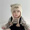 Gorro con orejas de pata de gato para bebé, gorro de punto cálido para otoño e invierno, diseño lindo de oso, unisex, gorro de lana a prueba de viento para bebés y niños pequeños