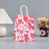 Exquisita bolsa de mano de papel kraft serie amor Tanabata Día de San Valentín regalo de vacaciones bolsa de regalo para fiesta en stock al por mayor