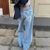 Enviado: Jeans de mezclilla lavada de pierna ancha, diseño retro francés de cintura alta, versátiles, con estampado de corazón, desgastados y con caída