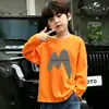 Camiseta de moda de manga larga 100% algodón para niños, nuevo modelo primavera 2026, top sencillo de dibujos animados para niños mayores y pequeños