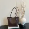 Otoño 2026 Nuevo Color Sólido Textura Tejida Casual Popular de Moda Sencillo Gran Capacidad Bolso Tote de Hombro Único para Debajo del Brazo