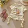 2026 Nuevo Estilo de Verano Camiseta con Estampado Dulce de Manga Corta Estilo Coreano para Niñas Camiseta con Cinta para Niños Tendencia en Ropa para Niños