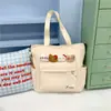 Nueva bolsa de tutoría linda y amigable para estudiantes, mochila minimalista con temática de bosque, bolso de hombro casual para niñas, bolsa de mano de gran capacidad