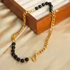 Collar de joyería con cuentas hechas a mano, hebilla ot, ágata negra natural, nuevo diseño retro de lujo ligero de nicho europeo y americano