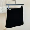 Saia de tricô de lã de algodão estilo coreano com botões e design único, quente e versátil para mulheres no outono e inverno, adequada para sobreposição