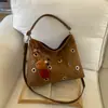 Nova Bolsa de Ombro de Grande Capacidade Primavera 2026 Nicho Elegante Simples Moda Bolsa Tote Casual Feminina Bolsa Transversal