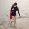 Traje de surf conservador de dos piezas para mujer, manga larga, negro, con protección solar, cintura alta, adelgazante, con perneras de corte recto y cobertura abdominal, adecuado para aguas termales y natación
