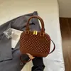 Bolso de lujo de alta gama para mujer, nuevo y popular bolso de hombro y cruzado de moda para el verano 2026