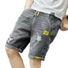 Shorts de mezclilla de verano para hombre de cinco puntos modernos rotos cintura elástica marca de moda ins holgados pantalones de cinco puntos para hombre