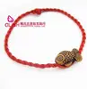 Tienda de 2 yuanes pulsera de cuerda roja de pescado anual al por mayor pulsera de pareja lote de regalo pequeño