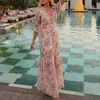 Colección de verano nueva para mujer europea y americana transfronteriza 2026: elegante vestido estampado tipo resort con cuello en N y abertura