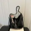 Nuevo bolso de hombro vintage de alta calidad para principios de otoño de 2026, bolso de gran capacidad, bolso cruzado, mochila, bolsos de mujer al por mayor