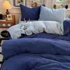 Nuevo juego de ropa de cama de terciopelo de leche de alta densidad, minimalista y sin marca para 2026, de tres o cuatro piezas, que incluye una funda de edredón, para uso doméstico, con un diseño más grueso y amigable con la piel