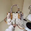 Bolso de alto valor para mujer 2026 nuevo retro europeo y americano bolso de mano para el trabajo temperamento versátil moda bolso de hombro bandolera