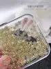 Joias para Nail Art de Flor Mini de Cinco Pétalas de Liga Metálica Mais Vendidas Transfronteiriças com Diamantes Coloridos Brilhantes e Flores Pequenas Vazadas Acessórios de Unha Usáveis