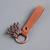 Llavero Colgante de Cuero para Hombres y Mujeres de Metal de Nicho Cubierta de Llave de Cobre Retro Cuerda Anillo de Llavero con Resorte Hebilla Colgante de Joyería