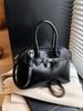 Comercio Exterior Super Caliente Bolsa Pequeña Mujer Primavera y Verano 2025 Nuevo Bolso Bandolera de Hombro Versátil Casual Nicho Portátil Bolso Kelly