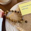 Pulsera retro personalizada moderna de lujo ligero elegante Ojo de Tigre Maillard pulsera con carácter fu regalo de cumpleaños para amigas pulsera