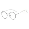 Nuevas Gafas Redondas Pequeñas Populares Transfronterizas con Filtro de Luz Azul Montura Metálica Abierta Estilo Universitario Gafas Planas Decorativas