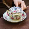 Tetera de cerámica hecha en fábrica con diseños de loto y peonía, juego de té kung fu de alta gama, tetera de mano con separación de té y agua, tetera individual