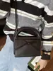 Bolso pequeño de lazo de moda transfronterizo para mujer, nuevo bolso de mano de nicho estilo coreano, bolso cuadrado pequeño versátil, bolso de hombro y bandolera