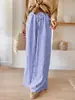 Nova linha de roupas femininas transfronteiriças europeias e americanas da Amazon: calça pantalona estampada listrada com bolsos inclinados