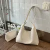 Bolso tejido vintage de gran capacidad para mujer, nuevo bolso cruzado de moda otoño 2026, bolso de hombro de alta calidad con textura para el día a día