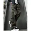 Jeans de camuflaje acampanados de corte slim fit, estilo oscuro retro americano de alta calle, pantalones holgados adelgazantes y modernos para hombres y mujeres