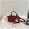 Bolso de mano tipo almohada de diseño de nicho estilo coreano para mujer, nuevo bolso de mensajero retro de moda con estampado de leopardo, bolso de hombro cruzado único