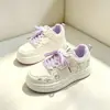 Superficie de cuero tallas 27-37 2026 nuevo estilo superficie de cuero zapatillas de lona para niños zapatillas deportivas para niños zapatillas de correr zapatillas de lona para niños primavera y otoño