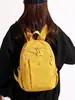 Mochila casual de color sólido, ligera, versátil, transfronteriza, unisex, mochila de viaje simple de gran capacidad, mochila escolar para estudiante